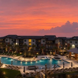 aerial view of pool at dusk