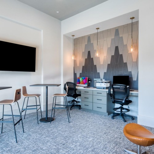 a room with chairs and a table